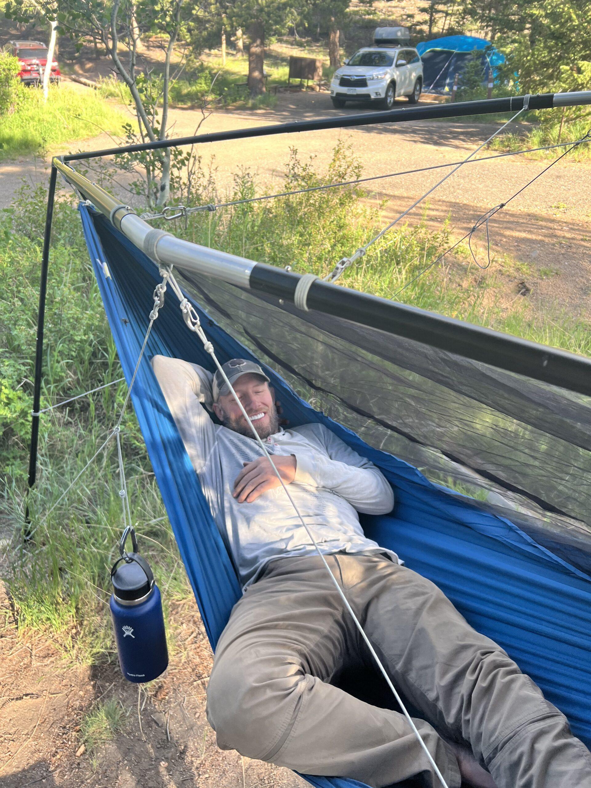man in blue hammock